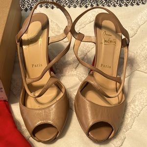 10.5 Tan Louboutin strapped heels